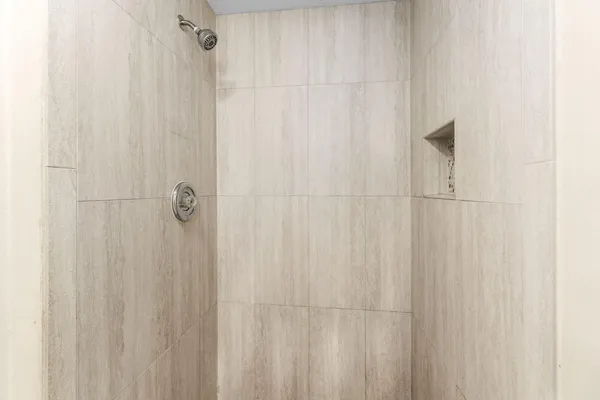 a bathroom with a shower curtain