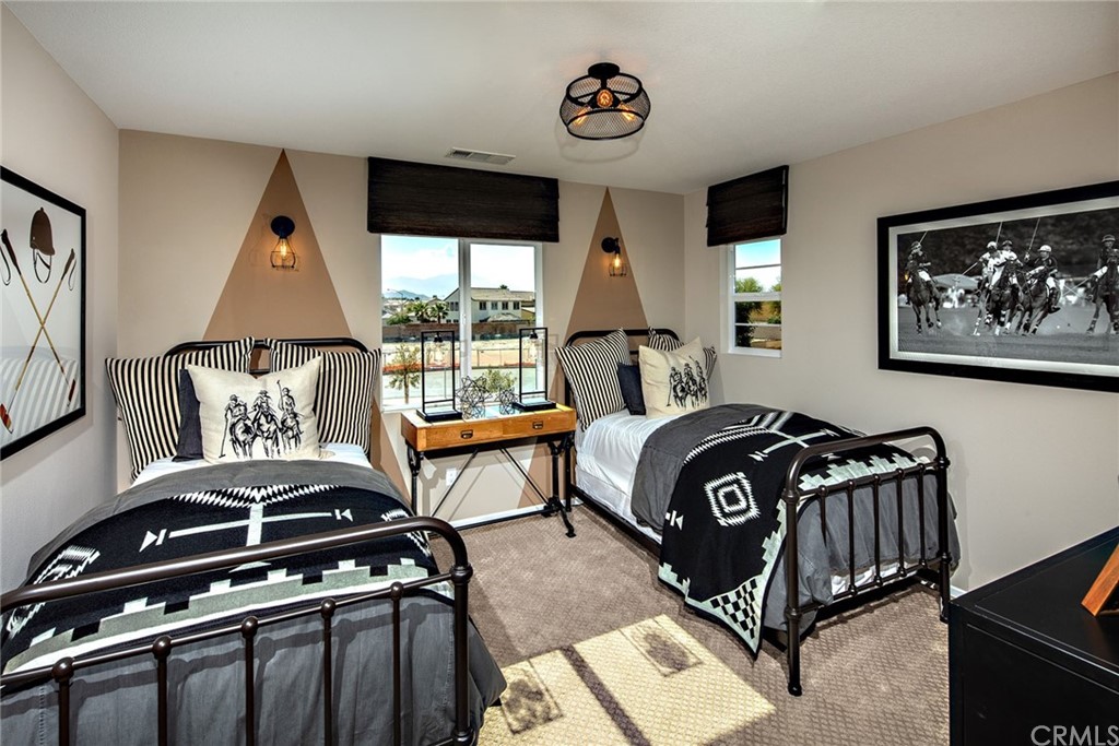 44402 Beringer Drive Indio, CA 92203 - Photo 15 of 18 a bedroom with a bed and wooden floor