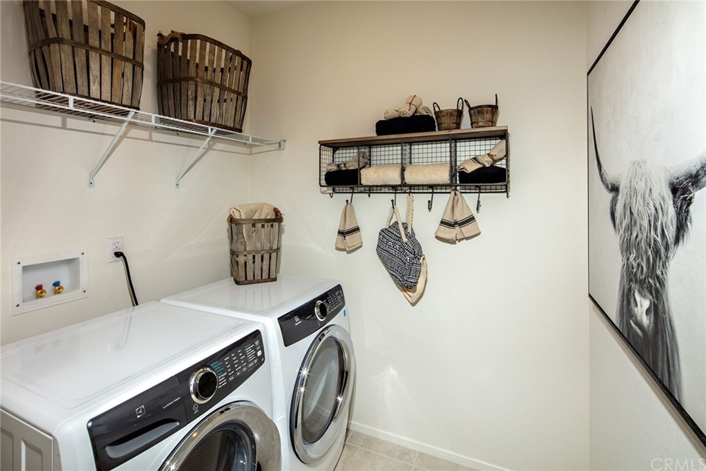 44402 Beringer Drive Indio, CA 92203 - Photo 17 of 18 a utility room with dryer and washer