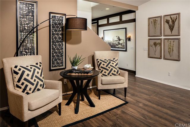 a view of a chairs and table in a room