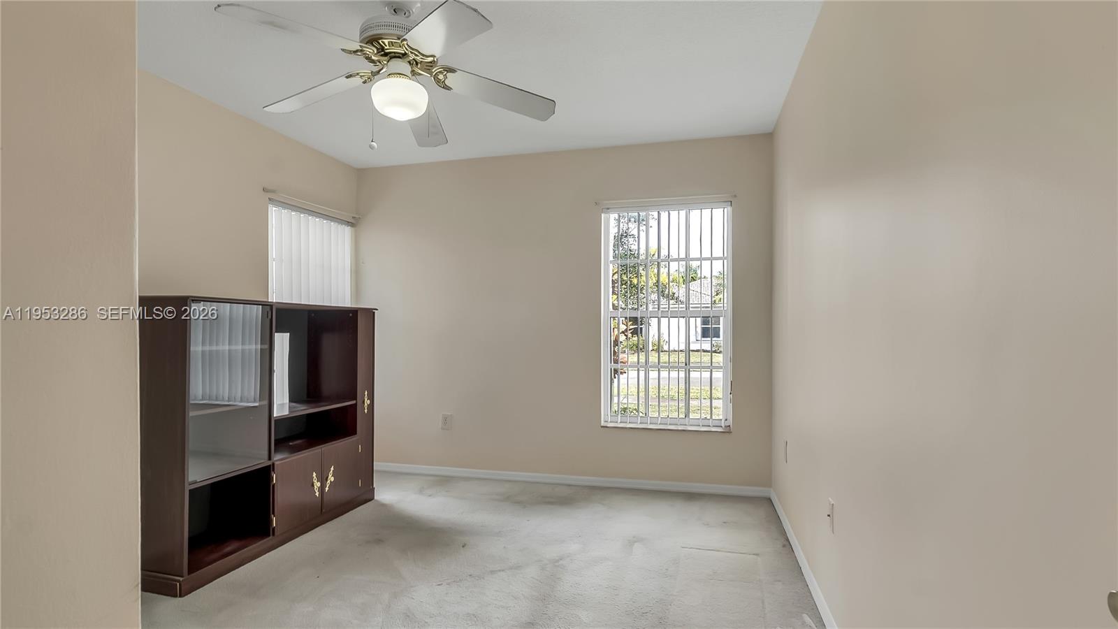 15486 Southwest 147th Street Miami, FL 33196 - Photo 24 of 30 a view of an empty room with a kitchen
