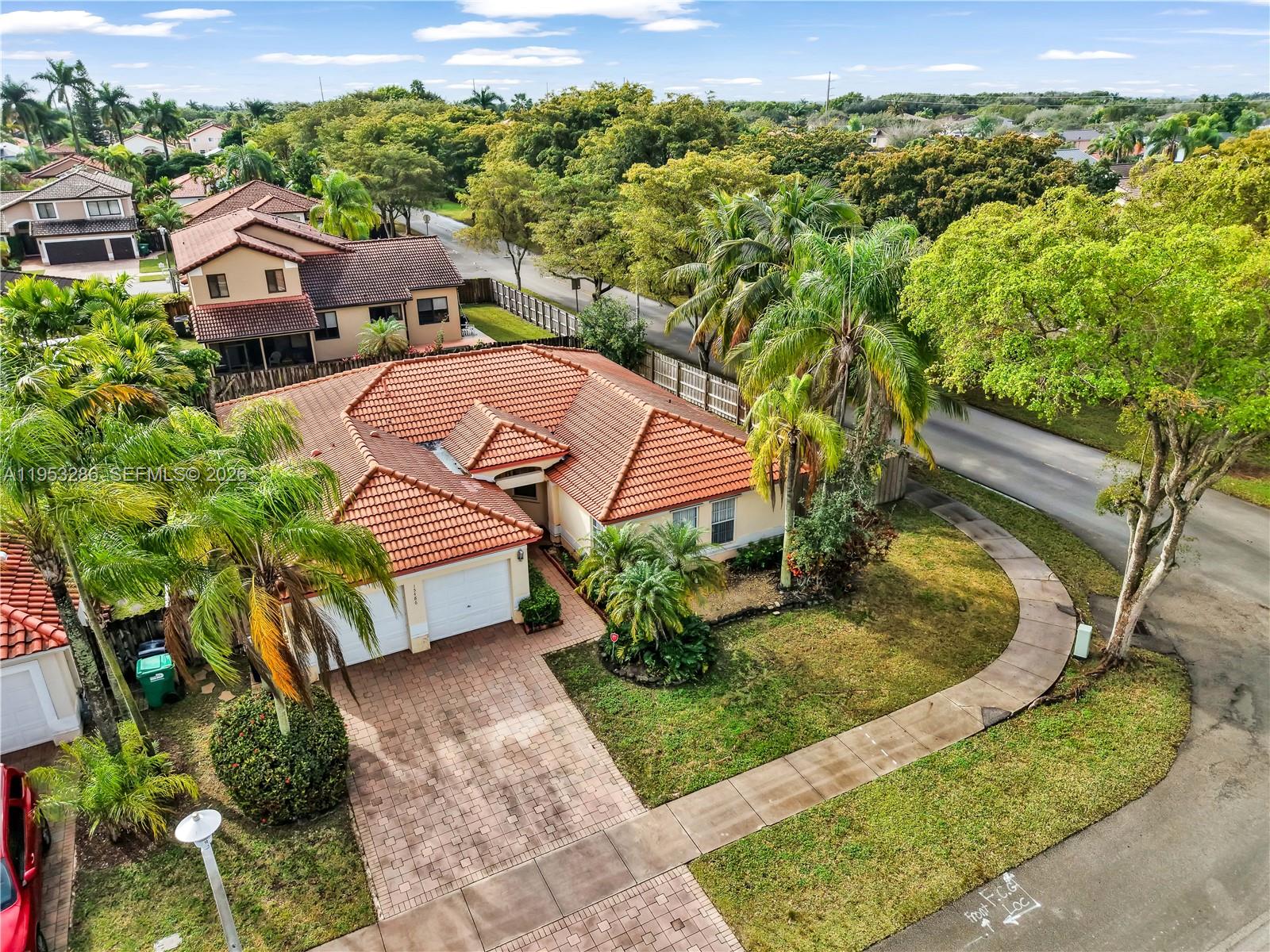 15486 Southwest 147th Street Miami, FL 33196 - Photo 27 of 30 an aerial view of residential houses with outdoor space