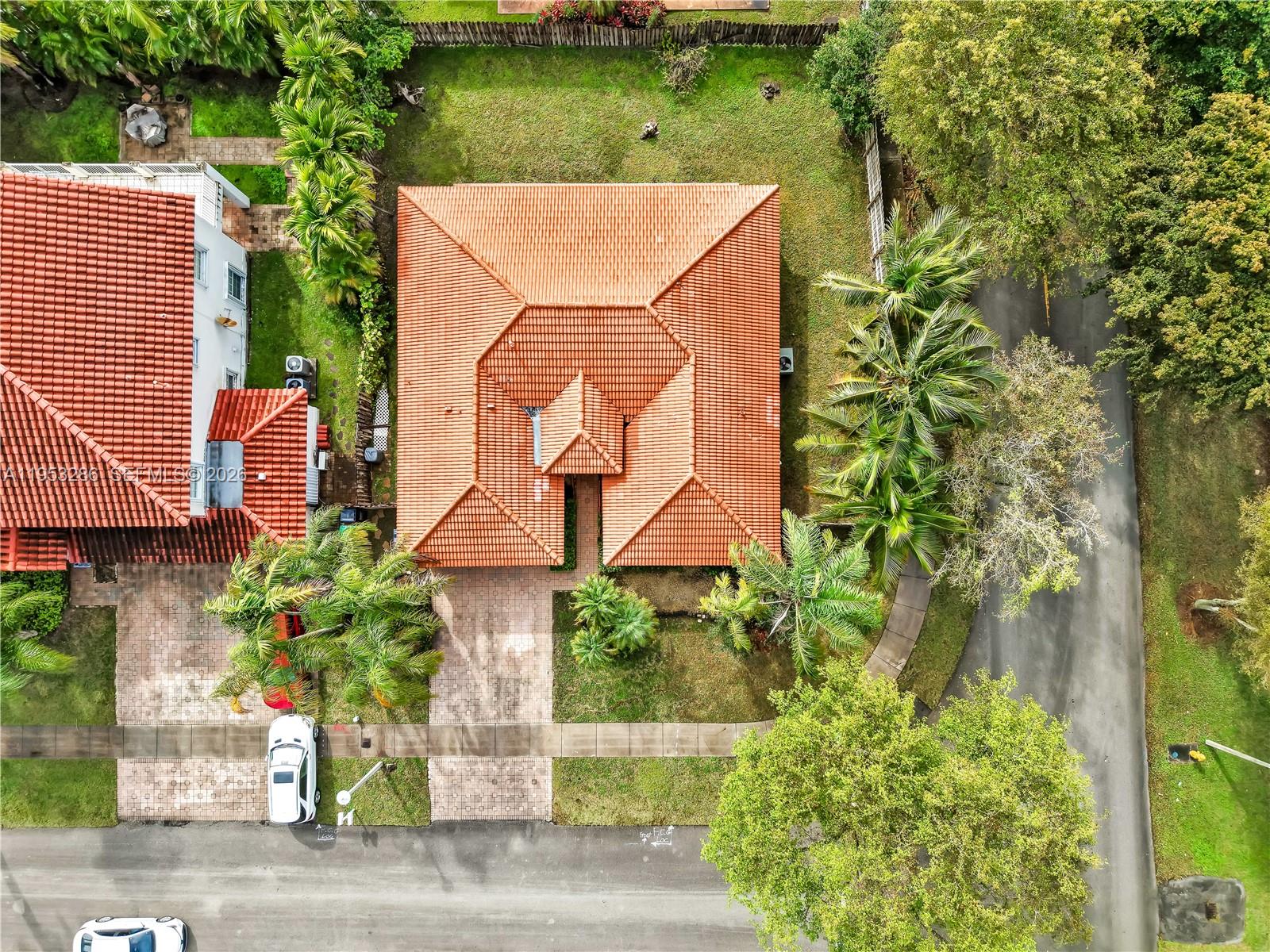 15486 Southwest 147th Street Miami, FL 33196 - Photo 29 of 30 an aerial view of a house with a yard basket ball court and outdoor seating