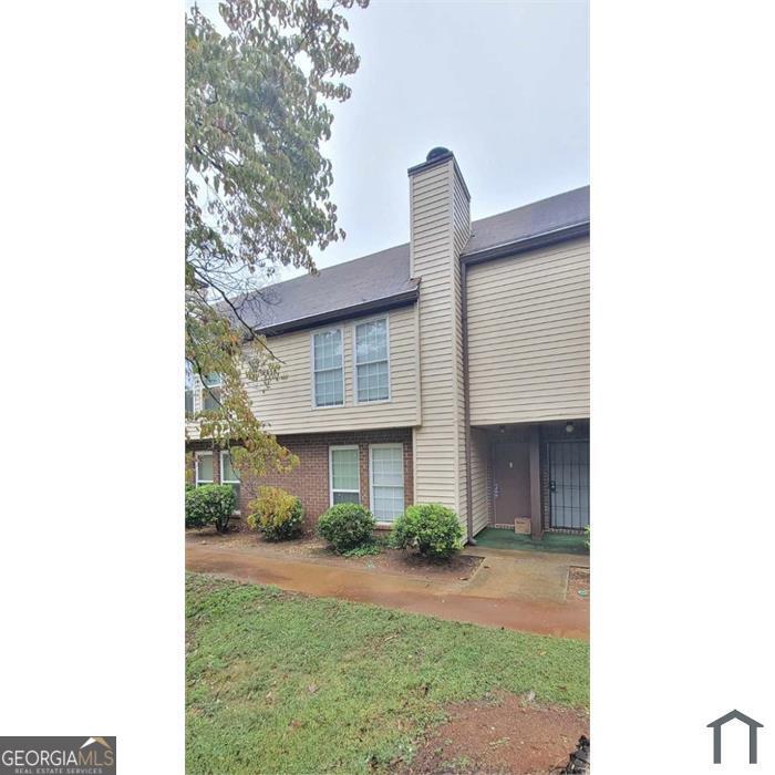 3162 Tangerine Court Decatur, GA 30034 - Photo 1 of 8 a front view of a house with garden
