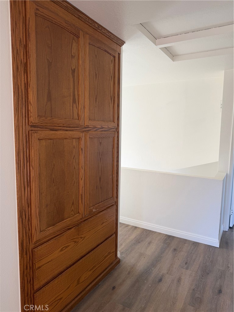 723 Ford Street Corona, CA 92879 - Photo 18 of 36 an empty room with wooden floor