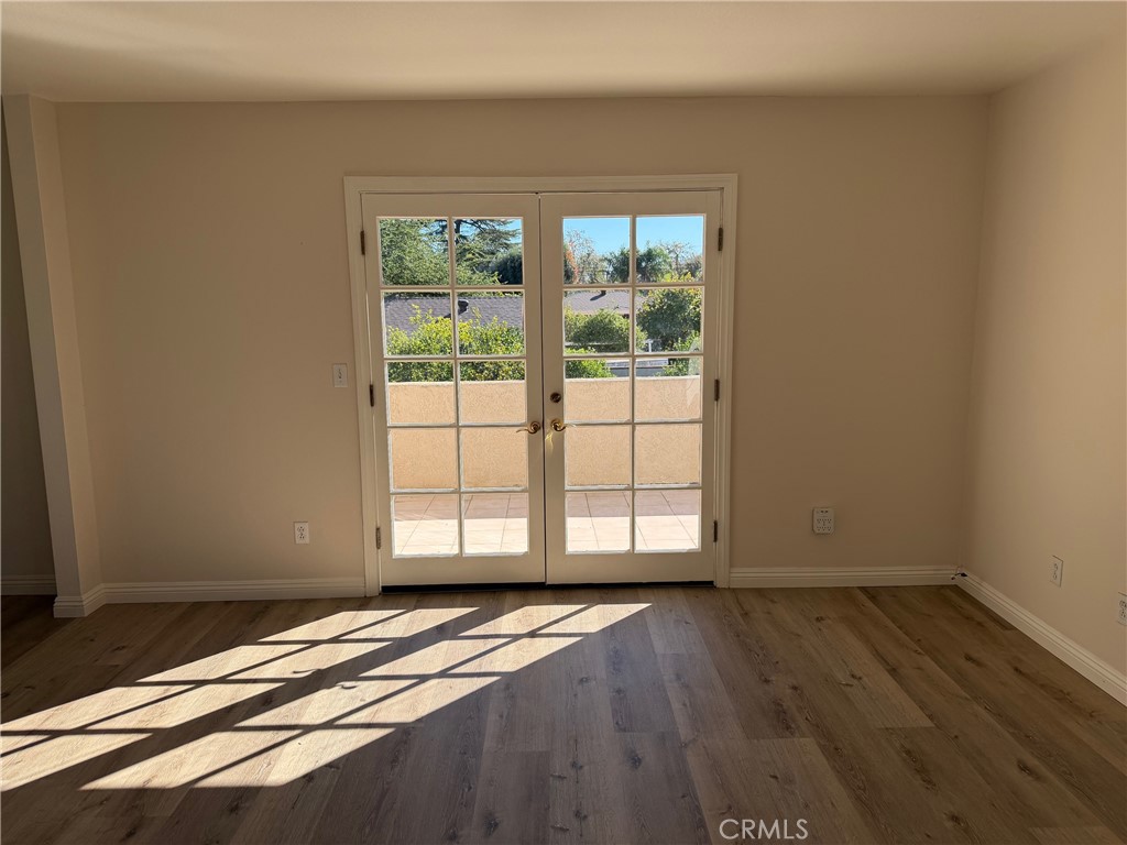723 Ford Street Corona, CA 92879 - Photo 27 of 36 a view of a livingroom with wooden floor and a window