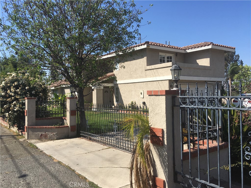 723 Ford Street Corona, CA 92879 - Photo 36 of 36 a view of a house with backyard and trees