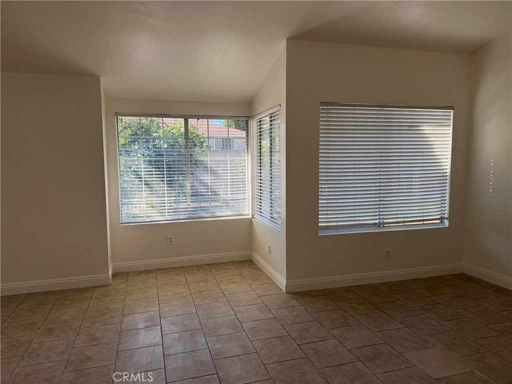 723 Ford Street Corona, CA 92879 - Photo 5 of 36 a view of an empty room with a window