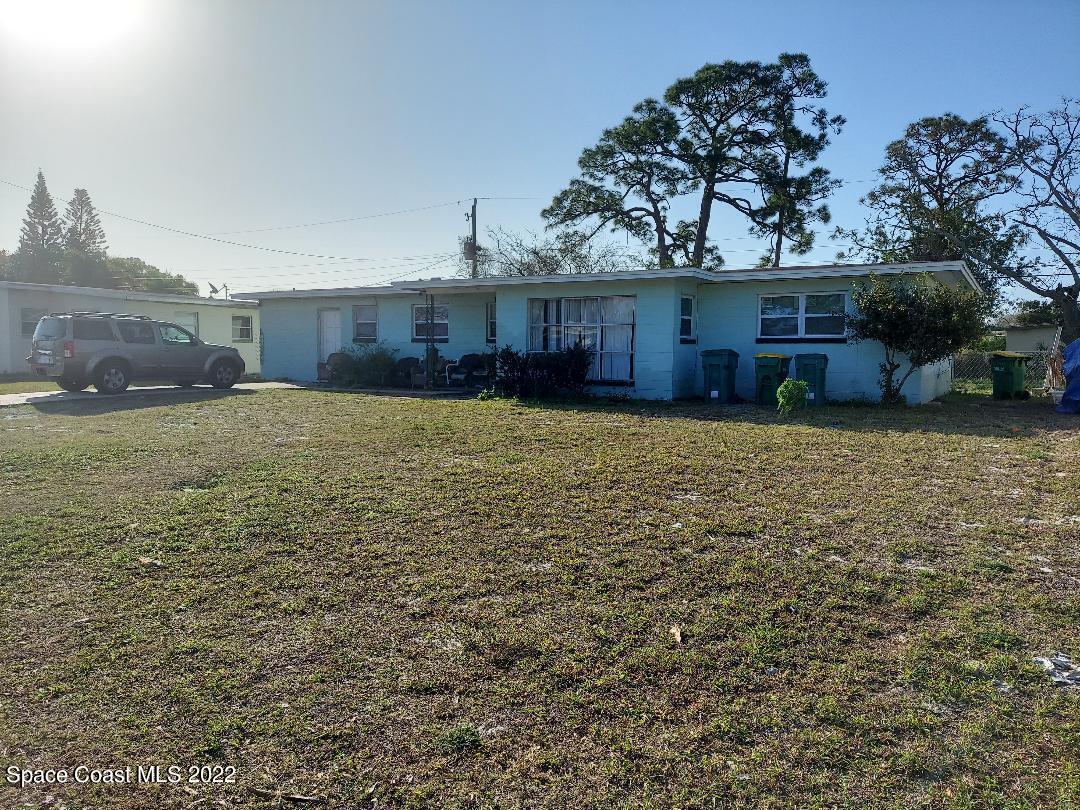 1047 Alamanda Lane Cocoa, FL 32922 - Photo 1 of 1 a view of a house with a yard