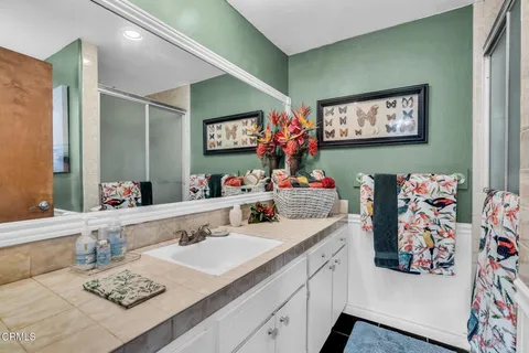 a dining room with a table and chairs