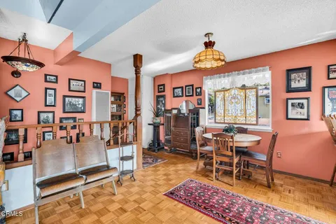 a kitchen with stainless steel appliances granite countertop a stove and a sink