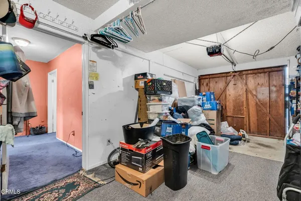 a picture of wall with a large mirror