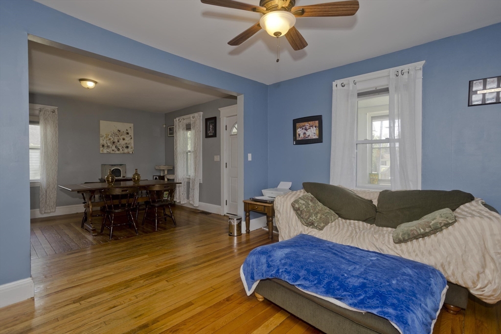 13 Granger Street Springfield, MA 01119 - Photo 12 of 41 a living room with furniture and a wooden floor