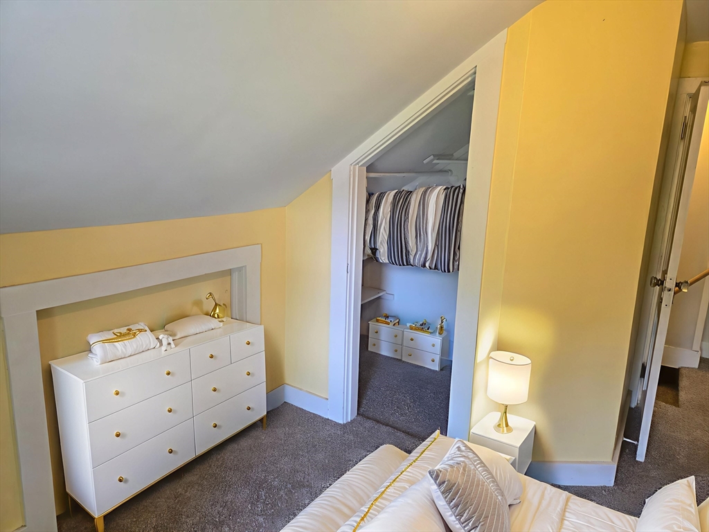 13 Granger Street Springfield, MA 01119 - Photo 21 of 41 a bedroom with a bed and a dresser