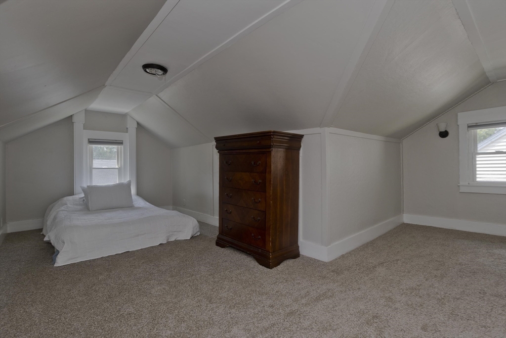 13 Granger Street Springfield, MA 01119 - Photo 24 of 41 a bedroom with a bed and a window