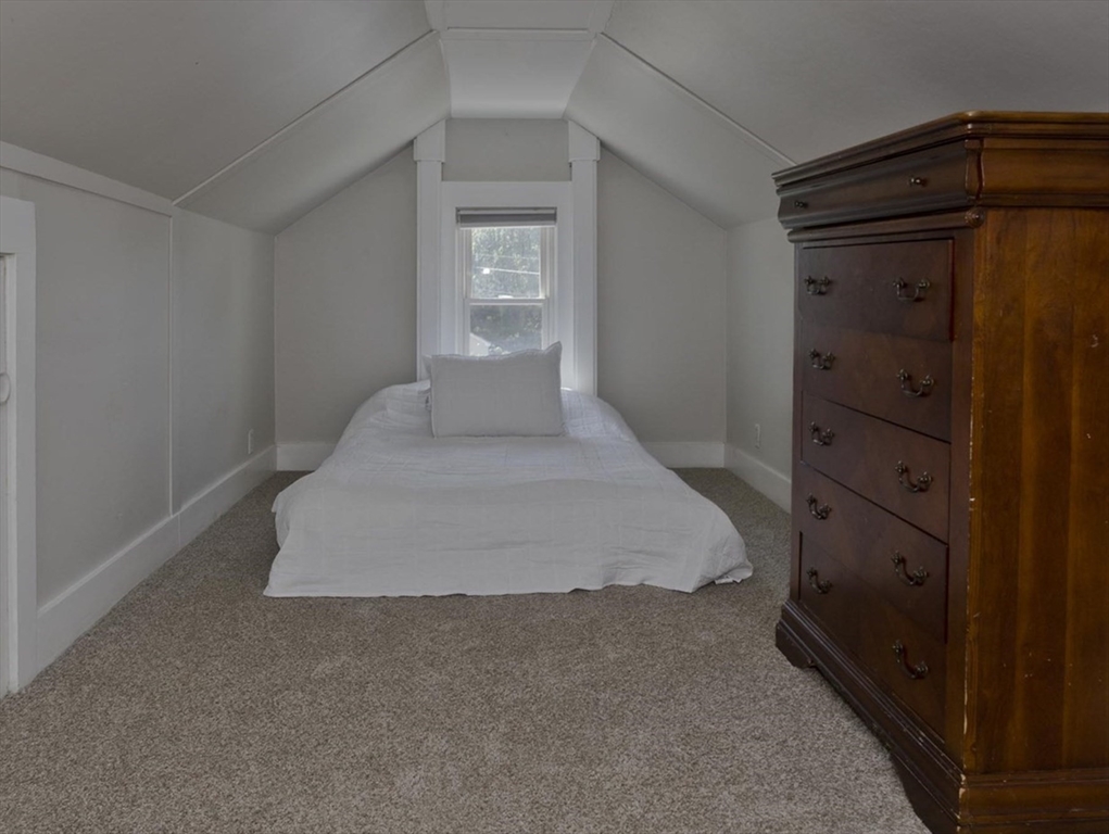 13 Granger Street Springfield, MA 01119 - Photo 41 of 41 a bedroom with a bed and a window