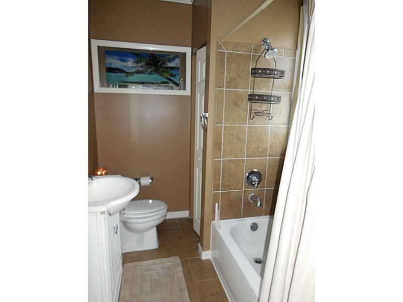 1301 Pine Hollow Road McKees Rocks, PA 15136 - Photo 16 of 24 Full Bath. The "upstairs" bath is well appointed with ceramic shower surround and floors. Great neutral decor.