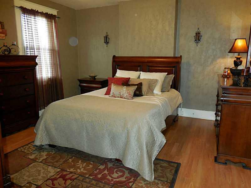 1301 Pine Hollow Road McKees Rocks, PA 15136 - Photo 19 of 24 Master Bedroom. The master bedroom with decorative wall sconces, laminate flooring and a large closet.