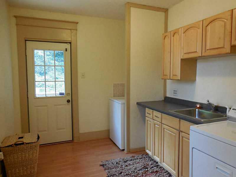 1301 Pine Hollow Road McKees Rocks, PA 15136 - Photo 21 of 24 Other. There s plenty of room to do your laundry in the second floor space. The door leads to a deck for an upstairs retreat from your chores.