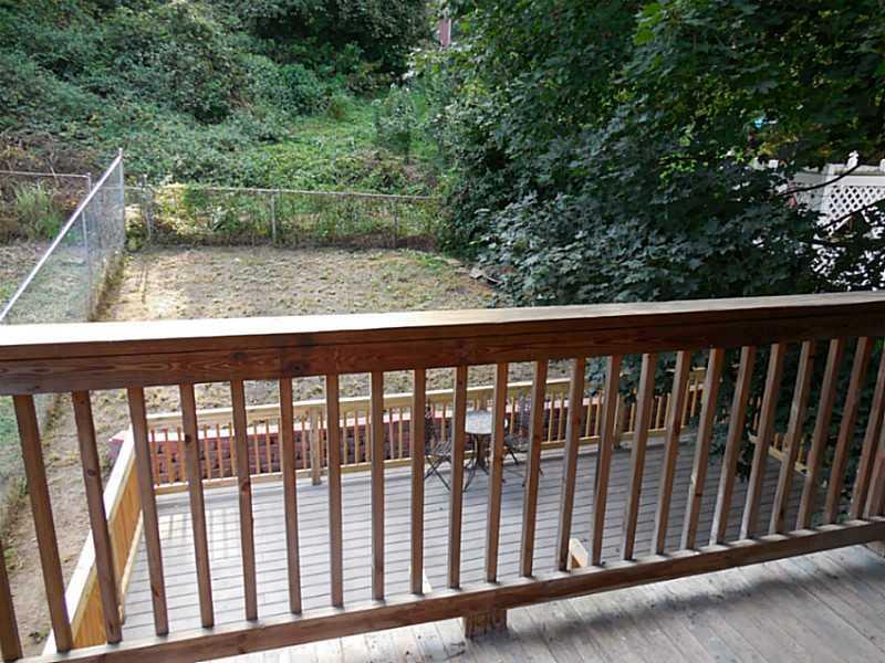 1301 Pine Hollow Road McKees Rocks, PA 15136 - Photo 22 of 24 Patio/Deck. Here s a view of the rear yard from the upstairs deck. Completely fenced and pet friendly.