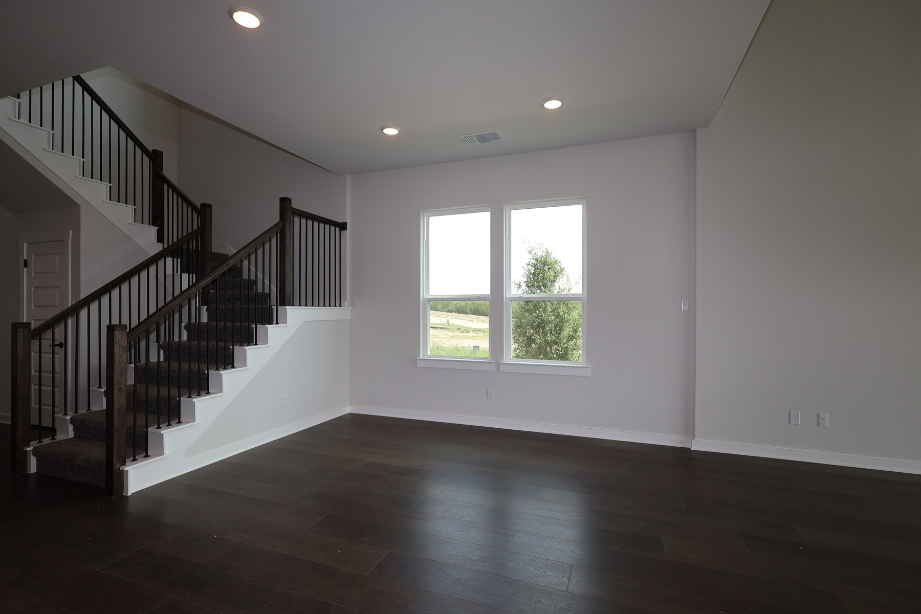 436 Leaning Rock Road Georgetown, TX 78628 - Photo 5 of 22 a view of room with window and hardwood floor