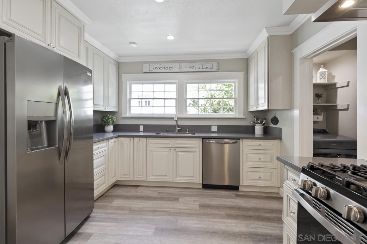 1122 Euclid Avenue Ontario, CA 91762 - Photo 11 of 51 a kitchen with granite countertop a refrigerator stove and sink
