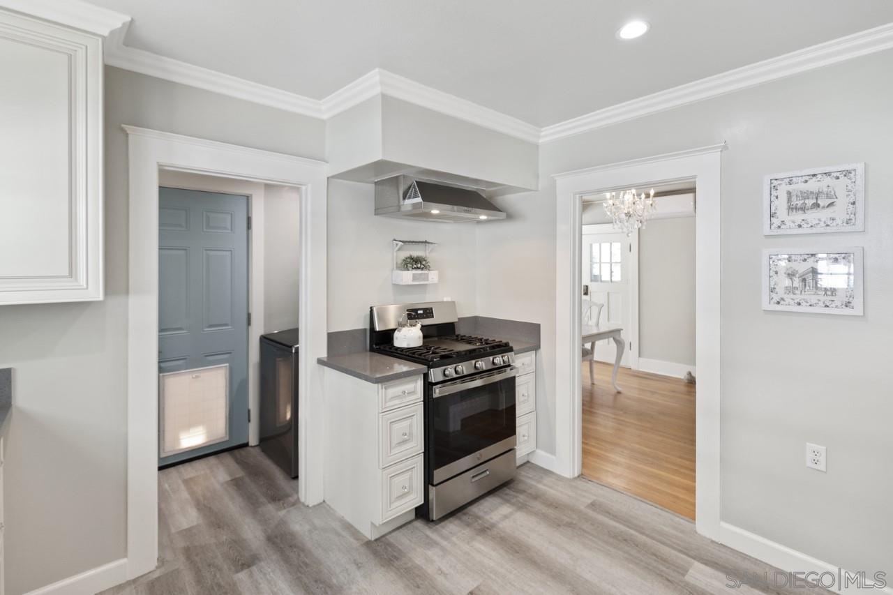 1122 Euclid Avenue Ontario, CA 91762 - Photo 14 of 51 a kitchen with stainless steel appliances a stove and a refrigerator