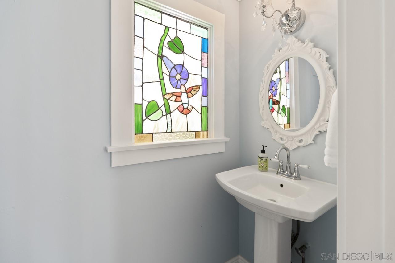 1122 Euclid Avenue Ontario, CA 91762 - Photo 16 of 51 a bathroom with a sink and a mirror