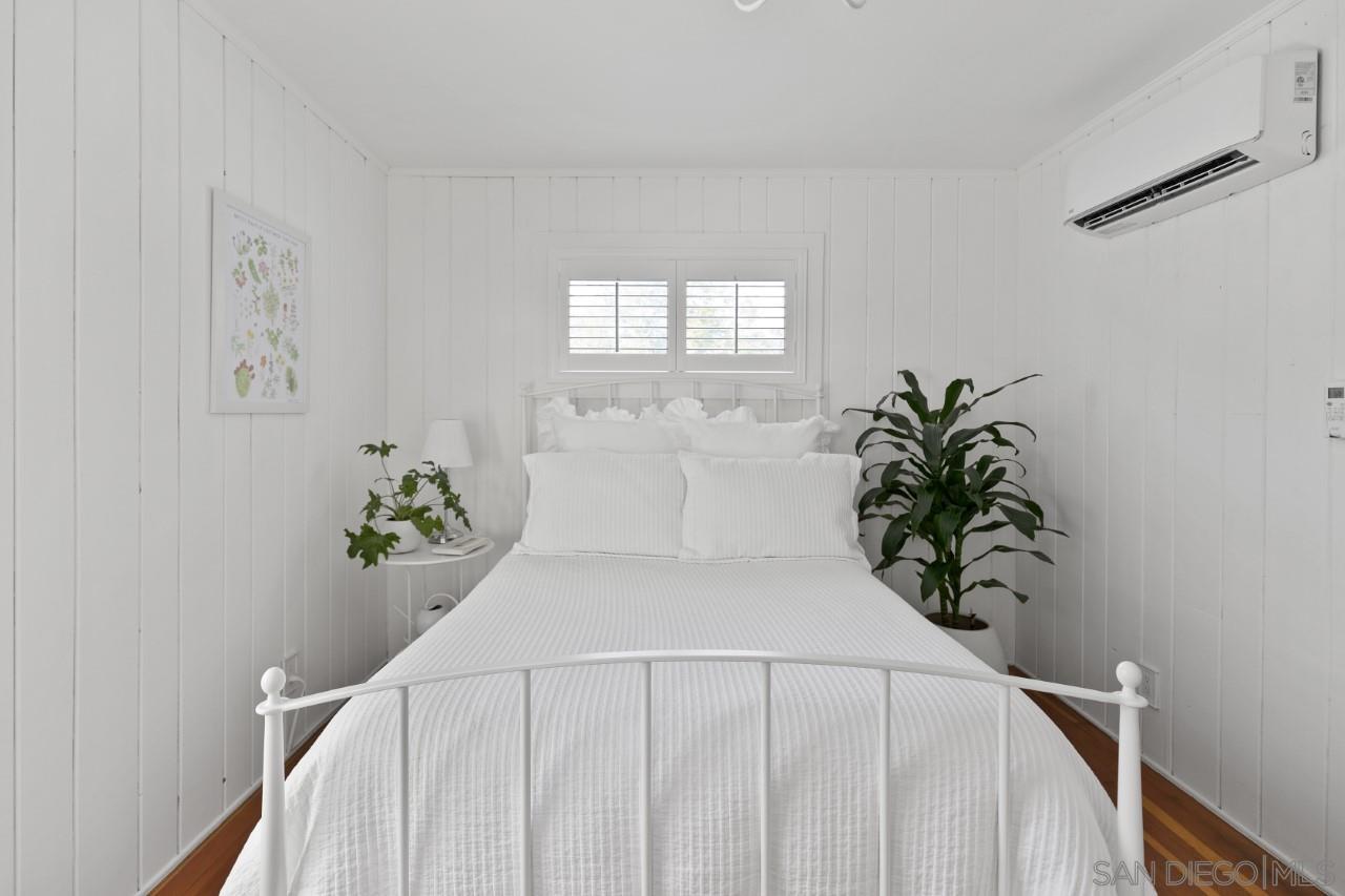 1122 Euclid Avenue Ontario, CA 91762 - Photo 29 of 51 a white bed sitting in a bedroom next to a window