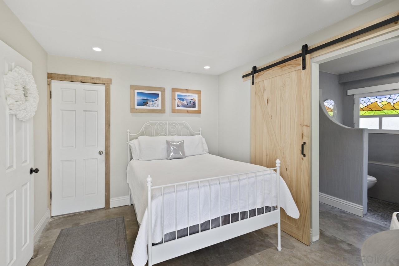 1122 Euclid Avenue Ontario, CA 91762 - Photo 37 of 51 a bedroom with a bed and a tv