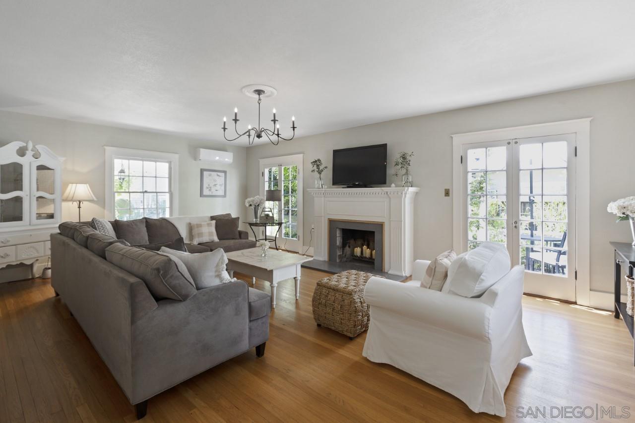 1122 Euclid Avenue Ontario, CA 91762 - Photo 5 of 51 a living room with furniture a fireplace and a flat screen tv