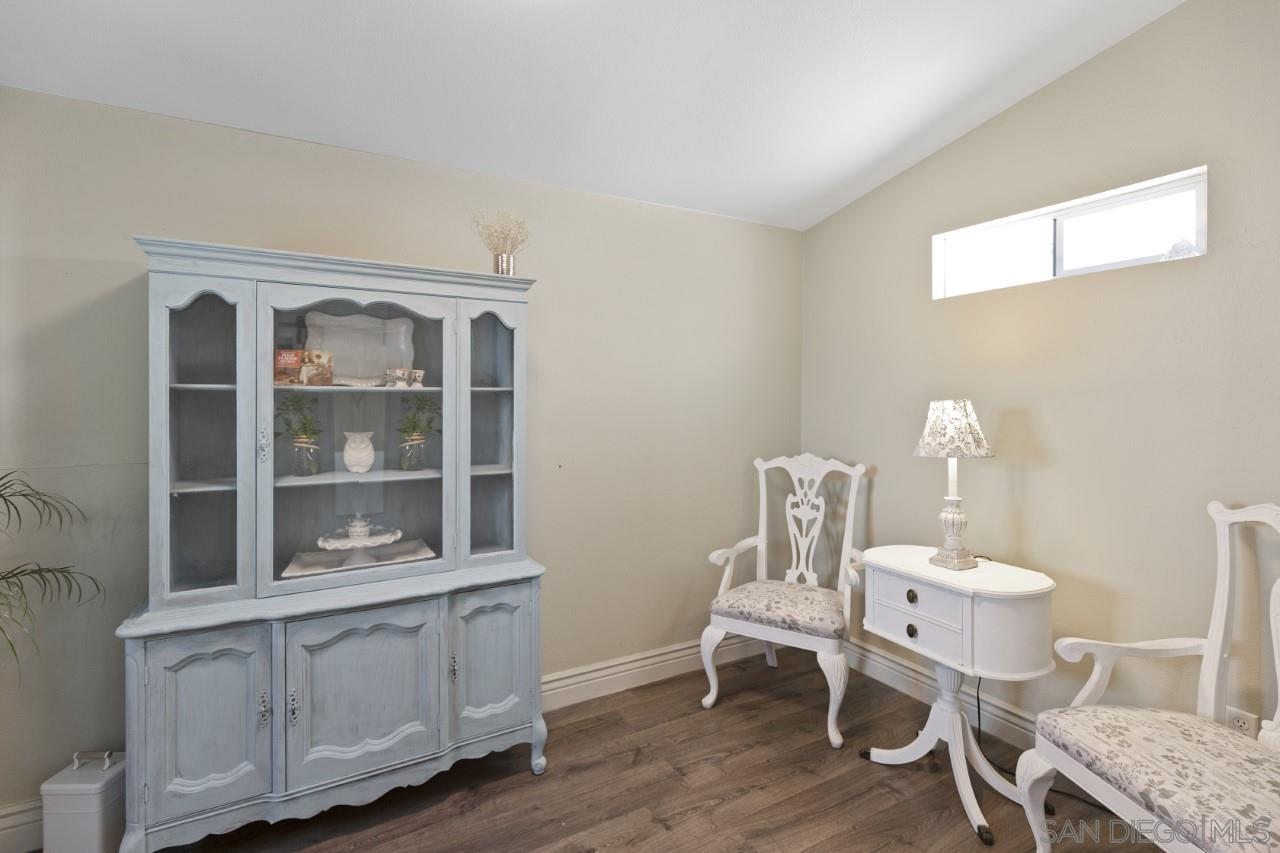 1122 Euclid Avenue Ontario, CA 91762 - Photo 42 of 51 a room with a table chairs and wooden floor