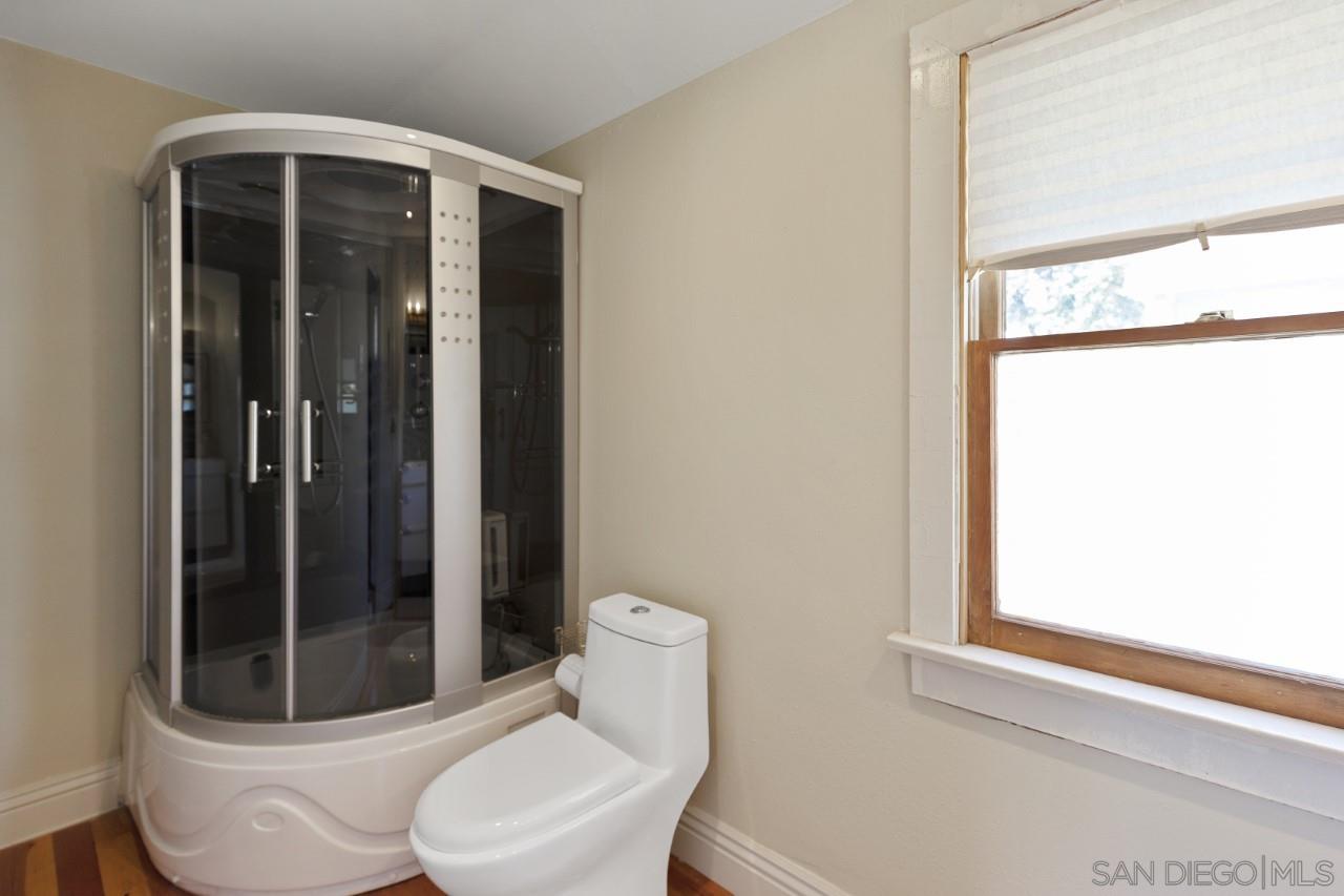 1122 Euclid Avenue Ontario, CA 91762 - Photo 46 of 51 a bathroom with a toilet and a shower