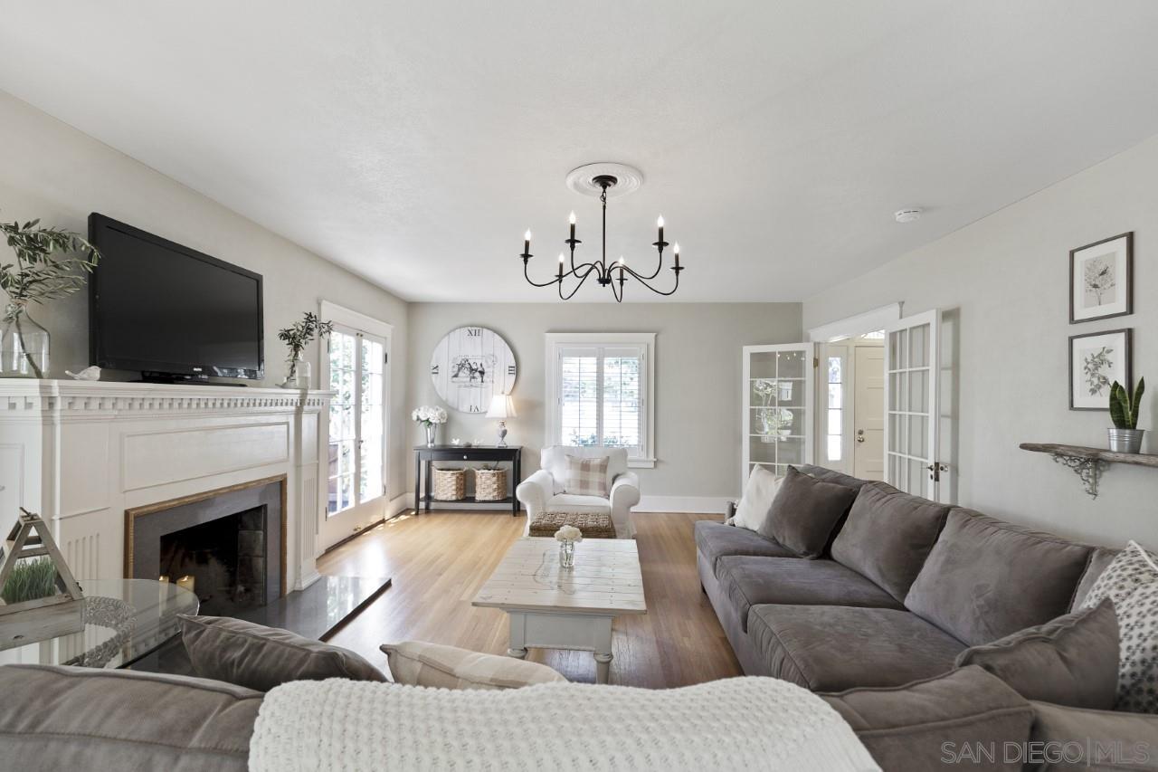 1122 Euclid Avenue Ontario, CA 91762 - Photo 6 of 51 a living room with furniture a fireplace and a flat screen tv