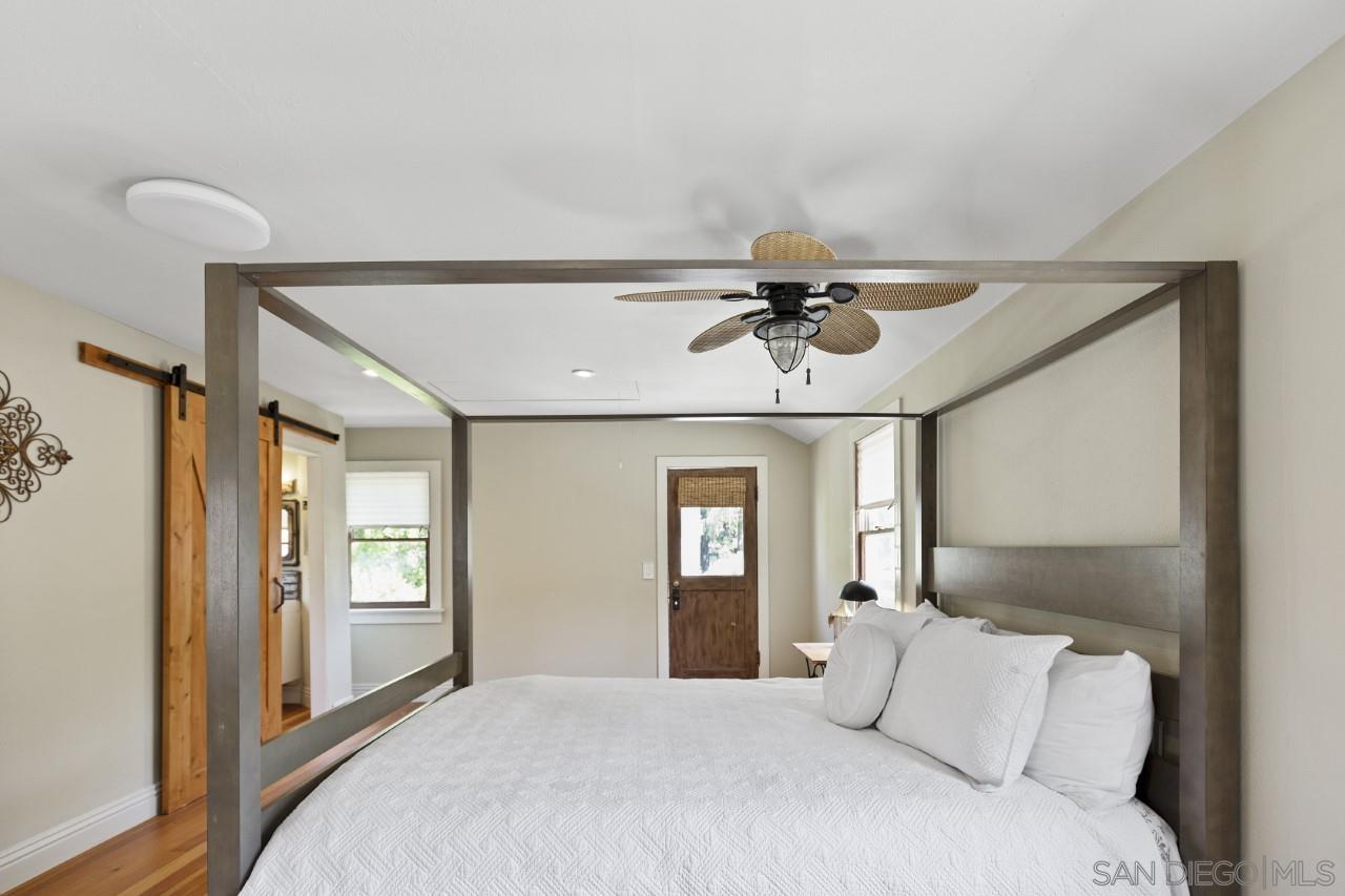 1122 Euclid Avenue Ontario, CA 91762 - Photo 51 of 51 a bedroom with a large bed and a chandelier