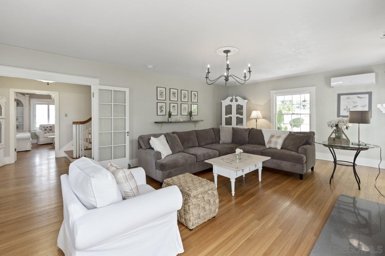 1122 Euclid Avenue Ontario, CA 91762 - Photo 7 of 51 a living room with furniture and a wooden floor