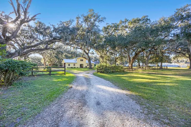 a view of a house with a big yard