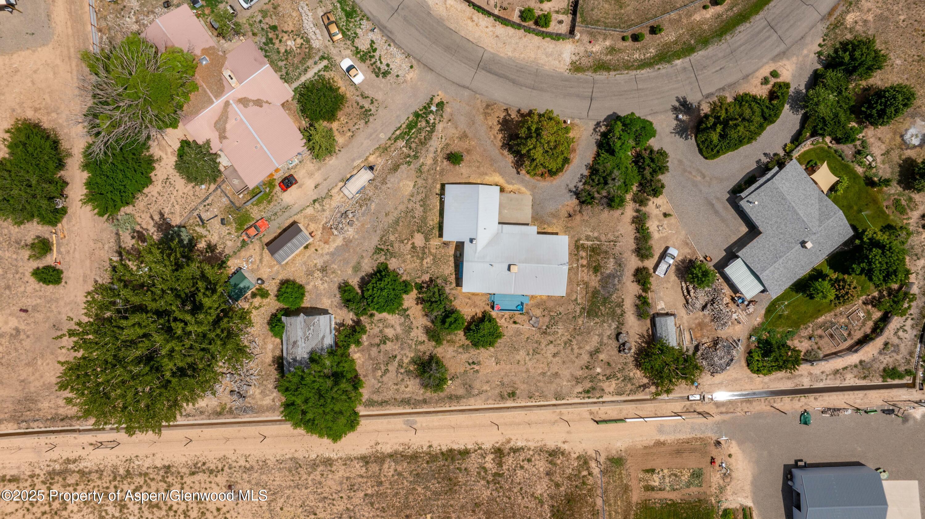 12303 West Spring Circle Eckert, CO 81418 - Photo 21 of 30 an aerial view of a house with a yard