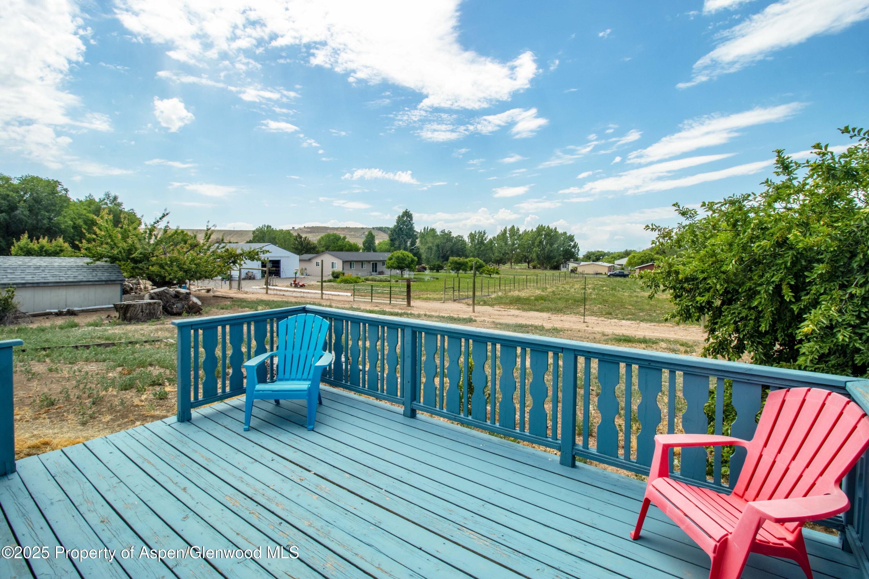 12303 West Spring Circle Eckert, CO 81418 - Photo 25 of 30 a view of a chairs on a deck