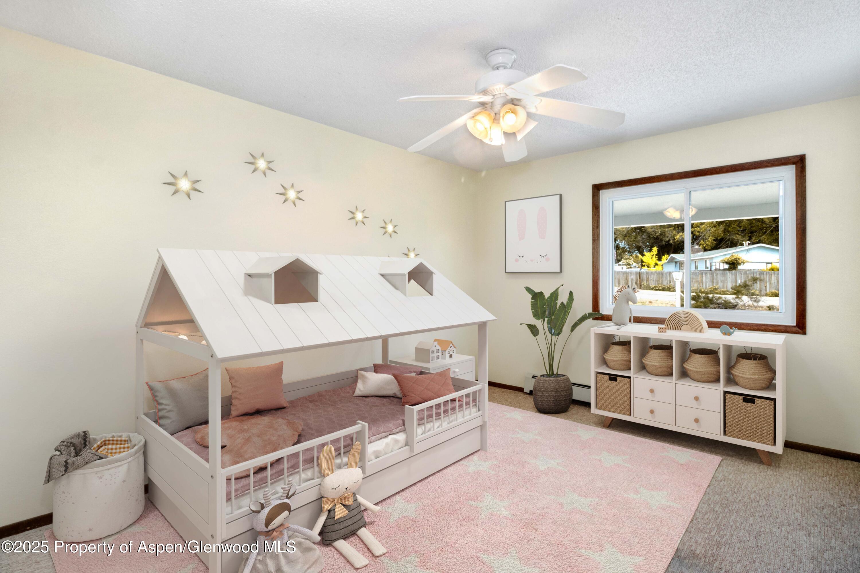 12303 West Spring Circle Eckert, CO 81418 - Photo 5 of 30 a living room with furniture and a chandelier