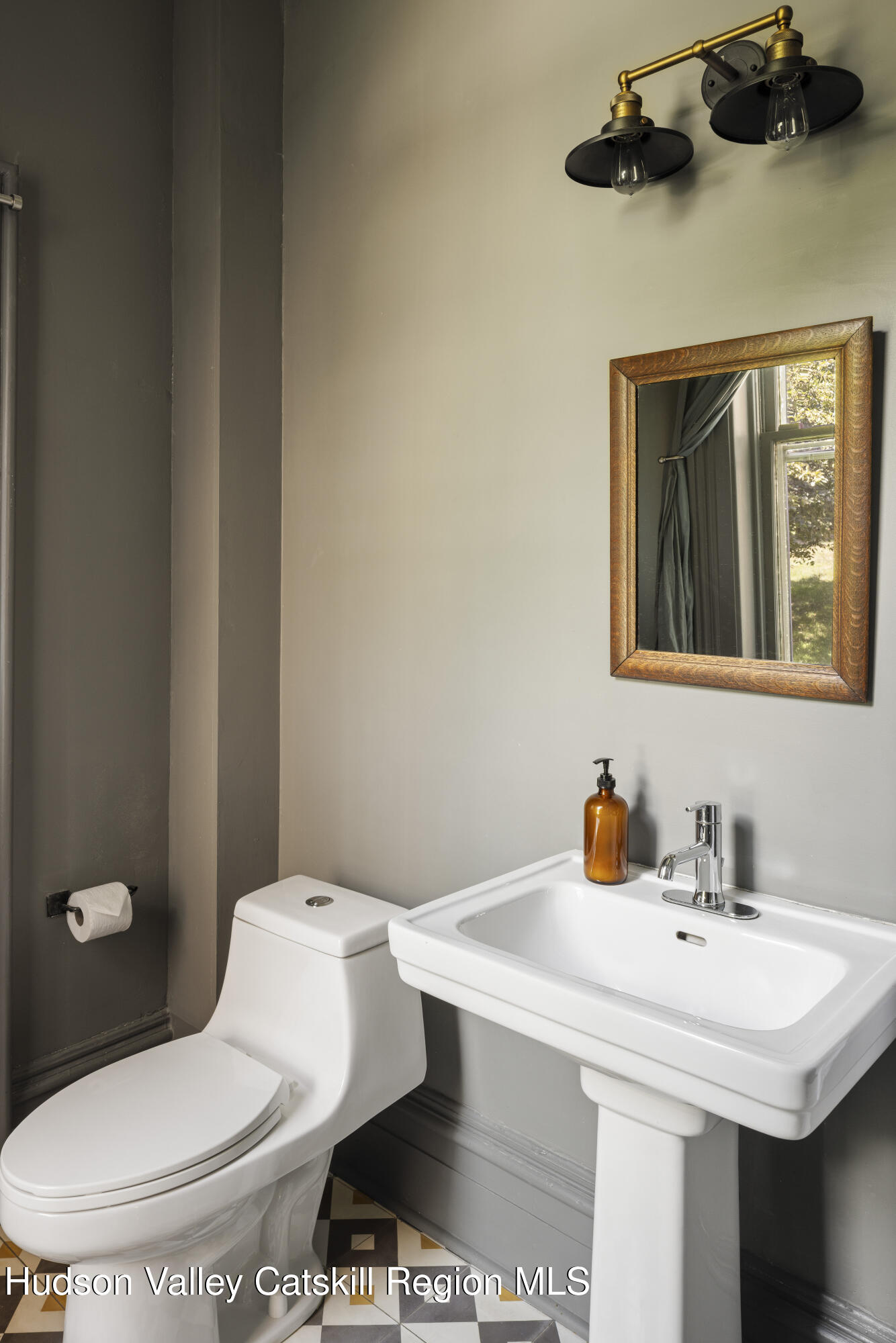 308 Main Street Catskill, NY 12414 - Photo 13 of 30 a bathroom with a sink and a toilet