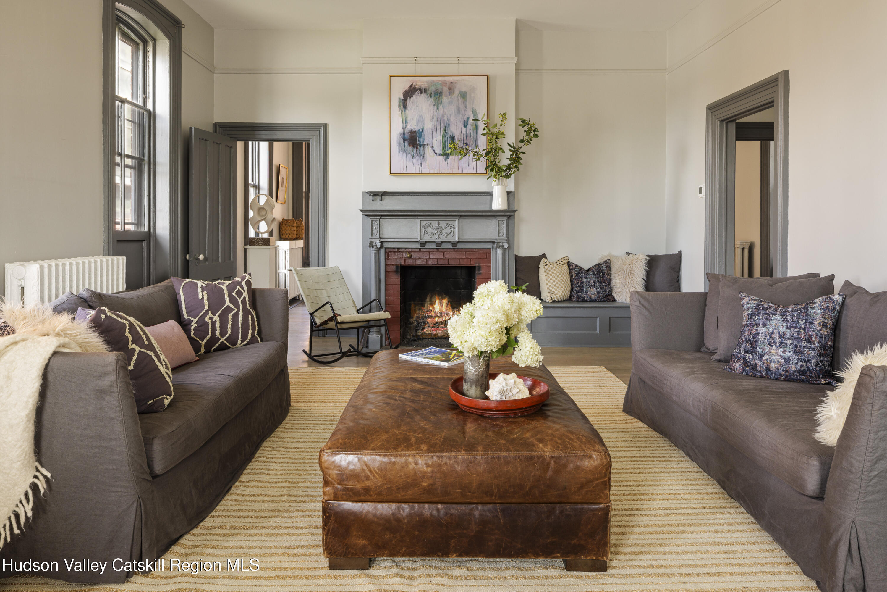 308 Main Street Catskill, NY 12414 - Photo 9 of 30 a living room with furniture and a fireplace