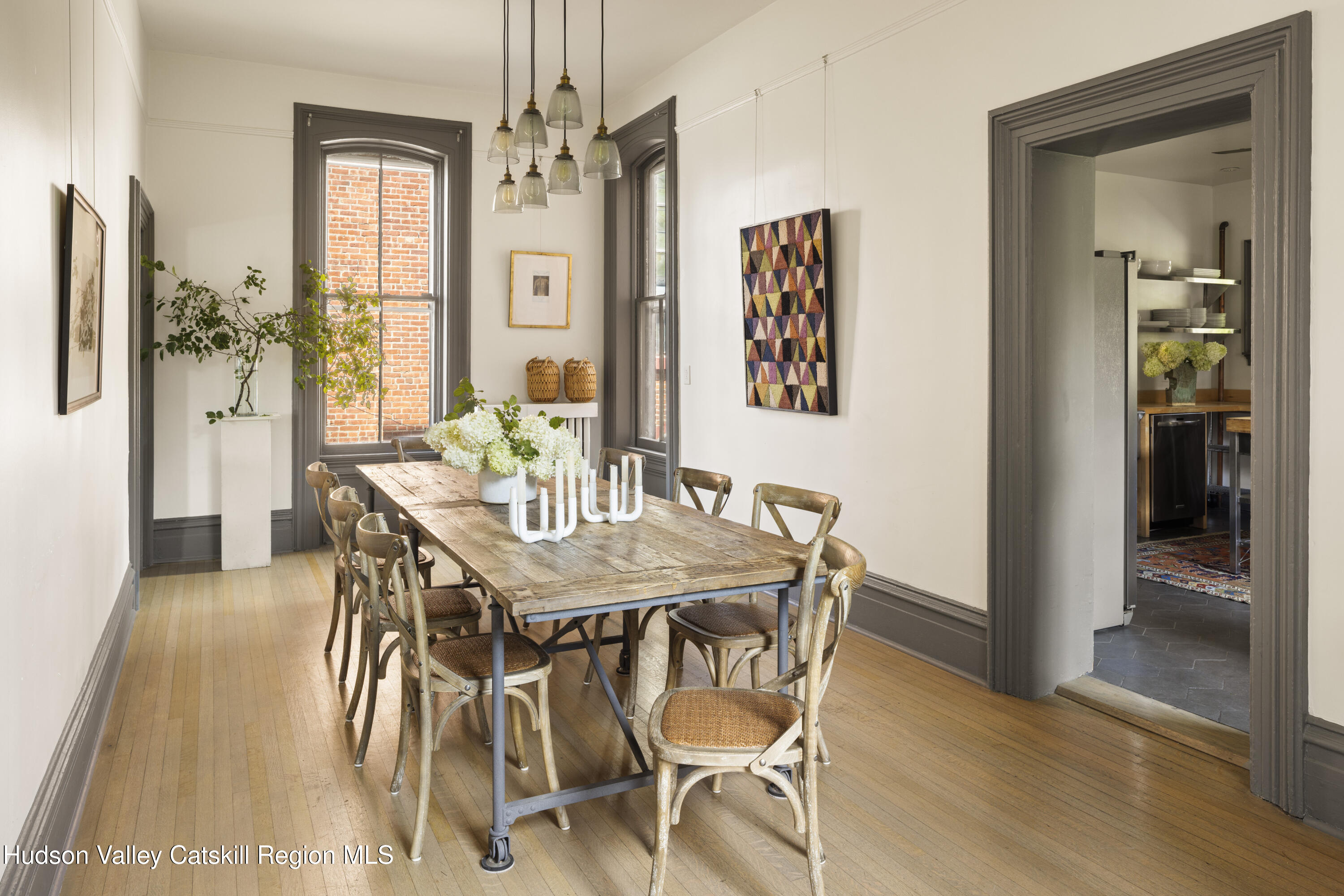 308 Main Street Catskill, NY 12414 - Photo 10 of 30 a view of a dining room with furniture window and wooden floor