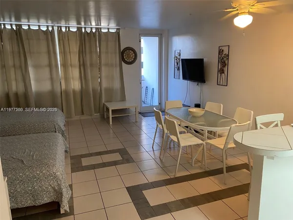 a view of a dining room with furniture