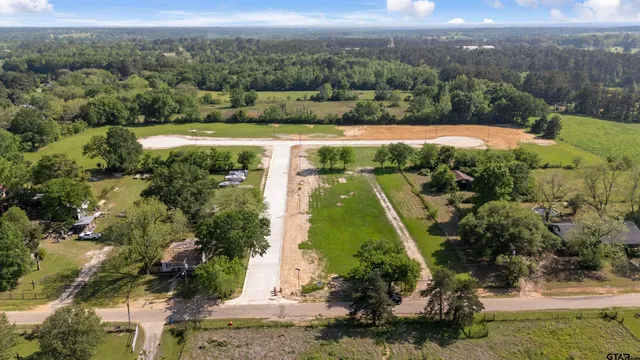 an aerial view of residential house with outdoor space