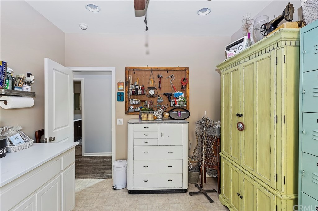 28212 Rustling Wind Circle Menifee, CA 92585 - Photo 22 of 28 a view of room with cabinet and mirror