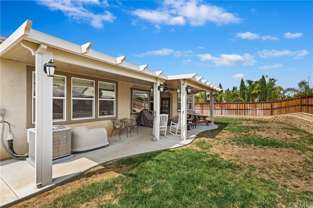 28212 Rustling Wind Circle Menifee, CA 92585 - Photo 26 of 28 a view of house with backyard porch and sitting area