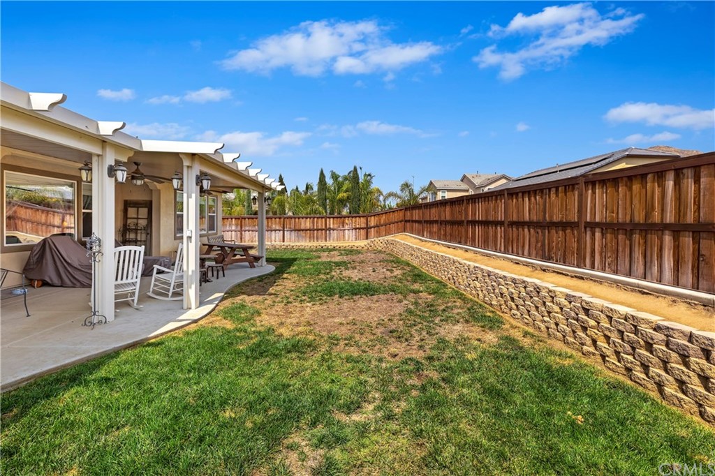 28212 Rustling Wind Circle Menifee, CA 92585 - Photo 27 of 28 a view of a pathway with a yard