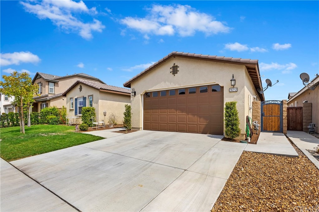 28212 Rustling Wind Circle Menifee, CA 92585 - Photo 3 of 28 a view of a house with a yard