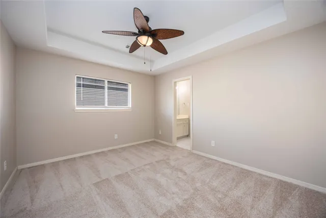 a view of room with ceiling fan